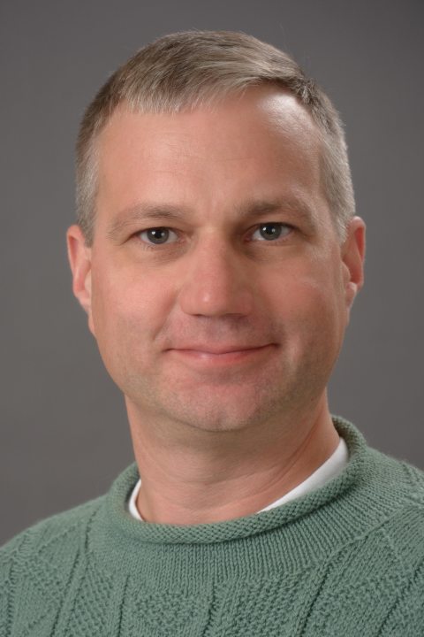 headshot of Casey Raymond