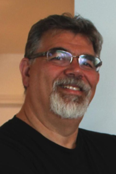 headshot of William DeMott