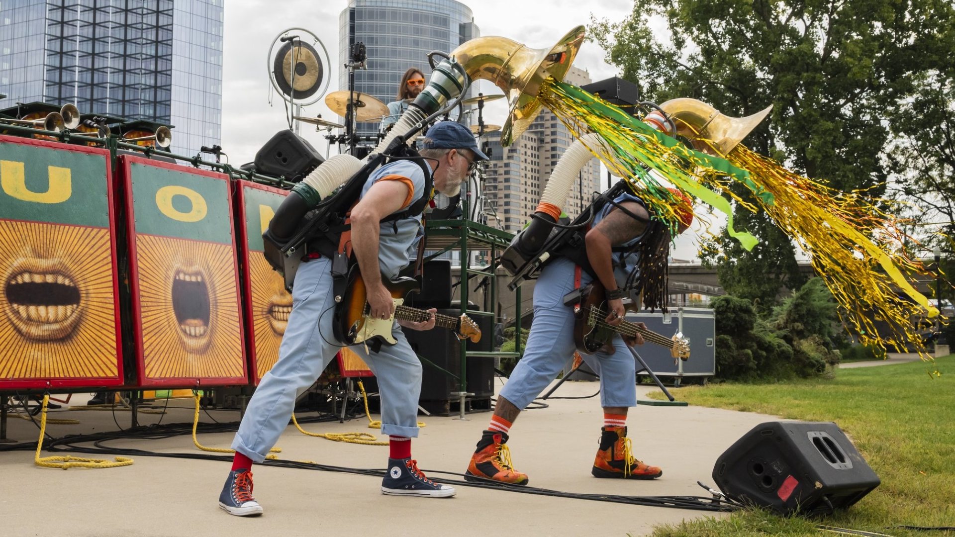 Two members of Squonk Opera play their guitars. 