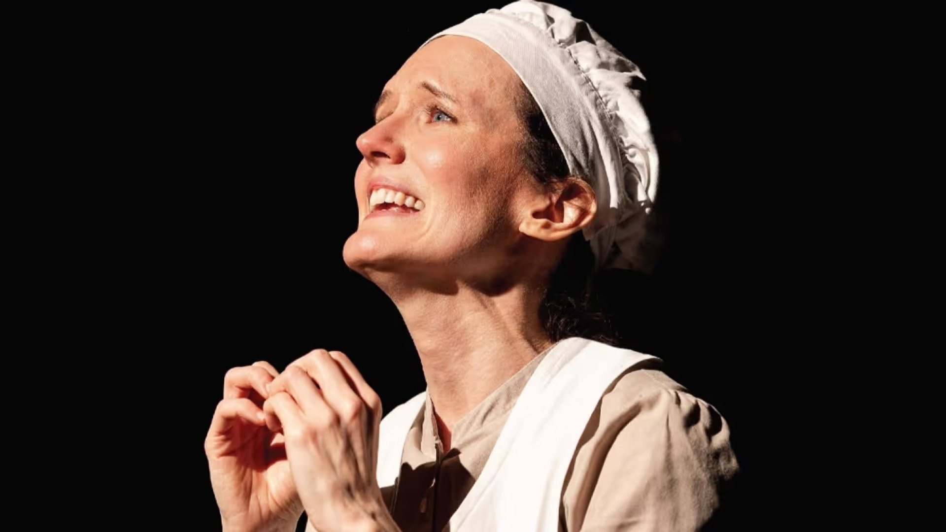 Actress Erin Layton performing the play Magdalen. 