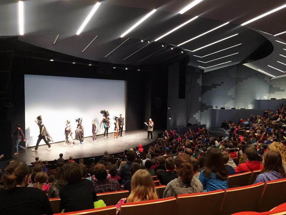 A group of performers on stage
