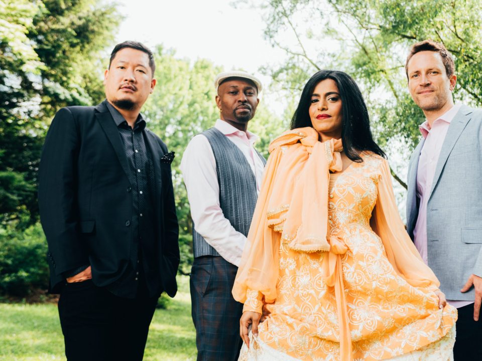 American Patchwork Quartet poses together outdoors.