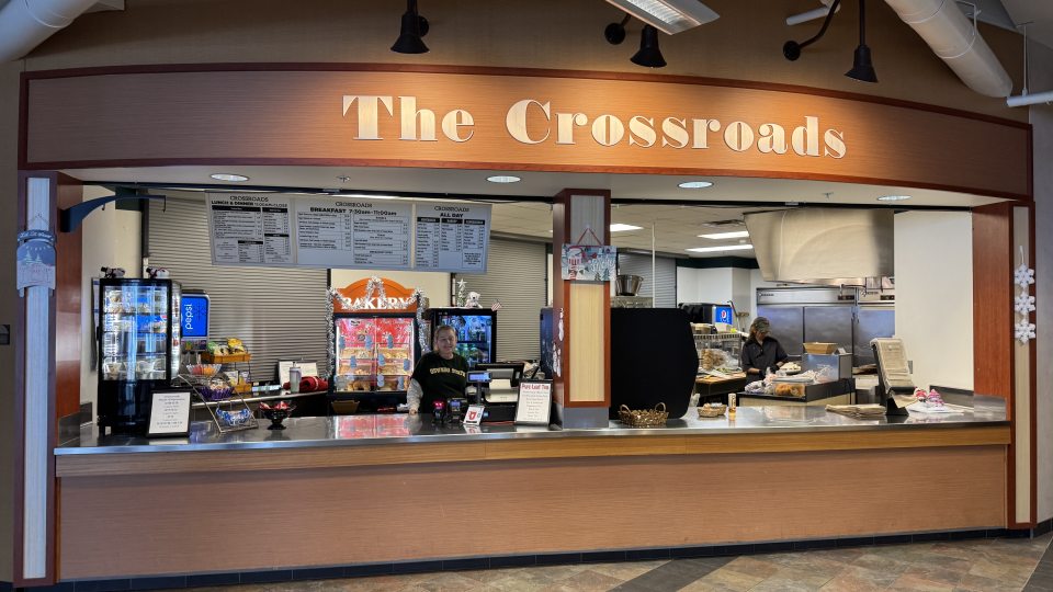 The Crossroads and a person serving food. 