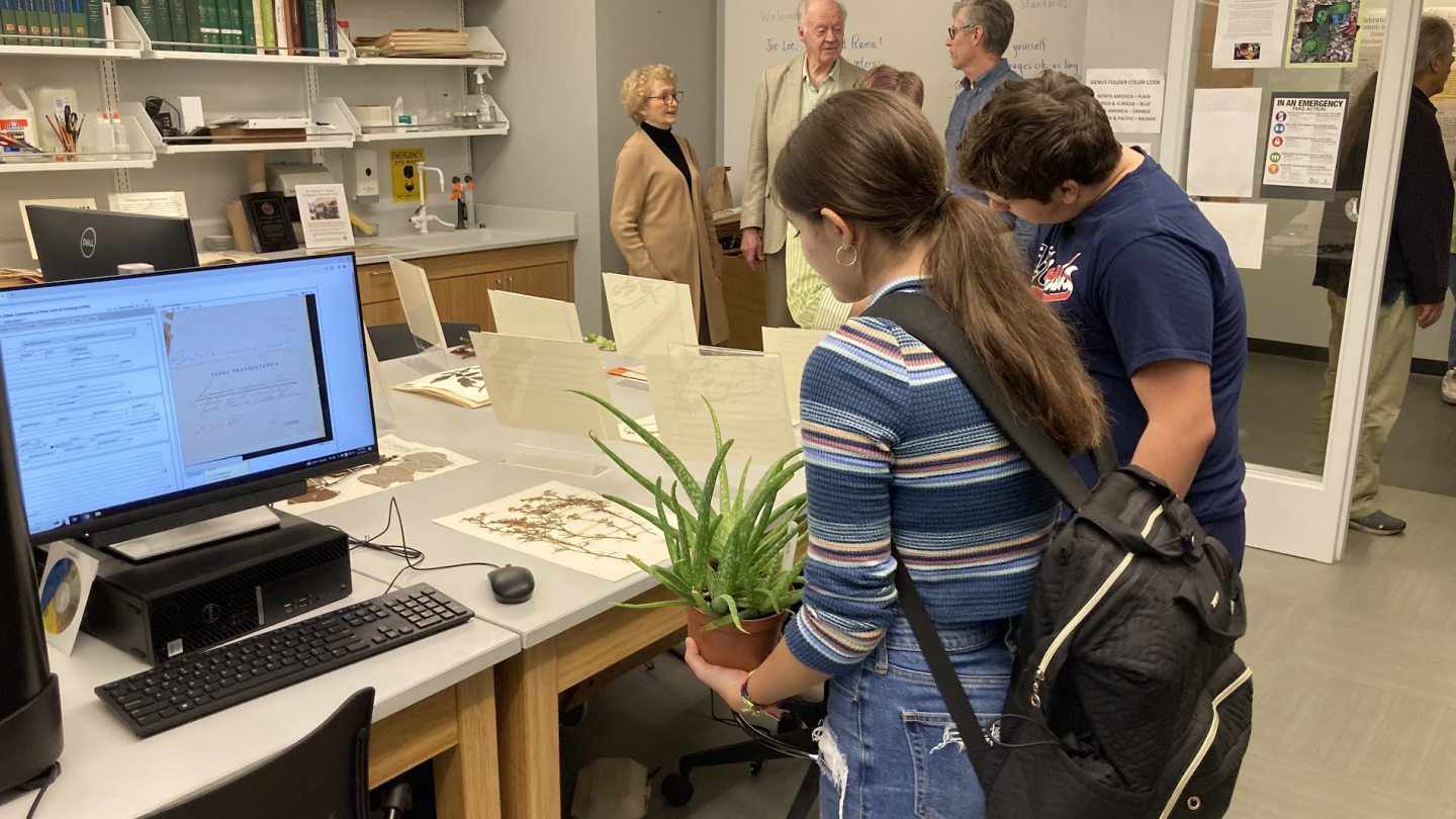 Students looking at various specimen documentation