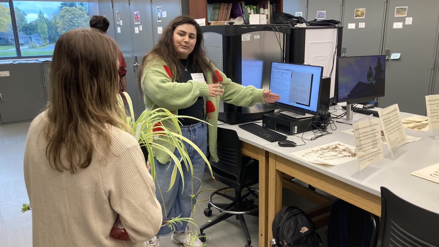 Students looking at information on a computer screen