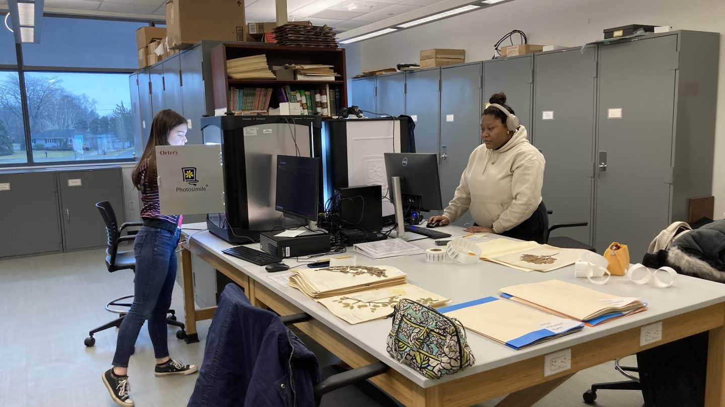 Two students working at a lab table