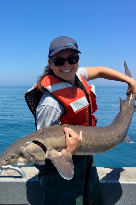 Ellen Karboski holding a fish
