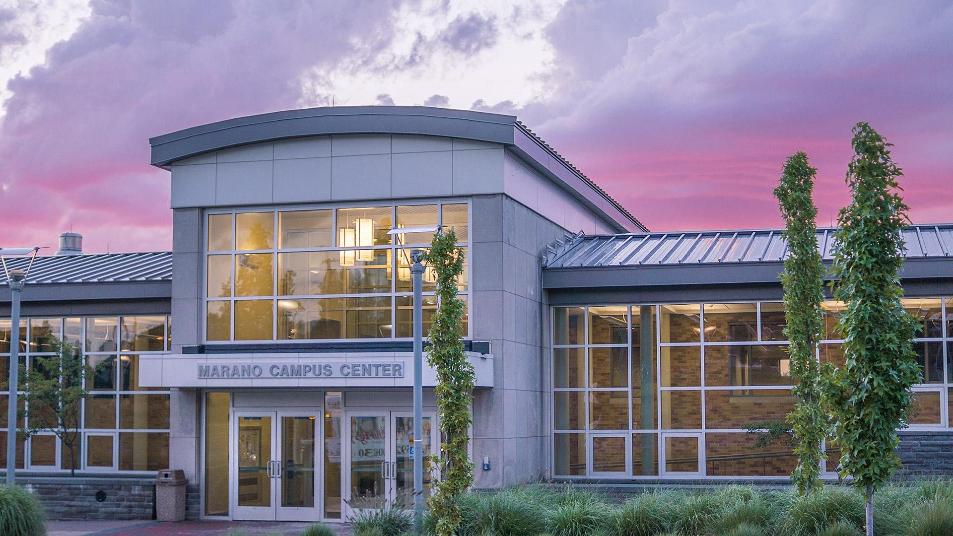 Marano Campus Center at dusk