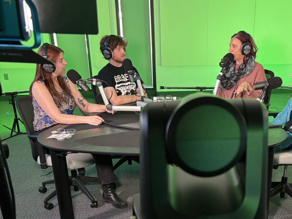Students in video podcast studio 