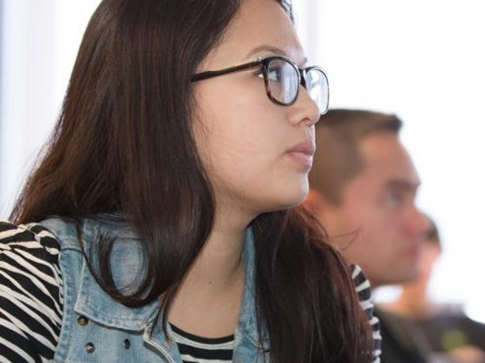 student focusing on a lecture in class