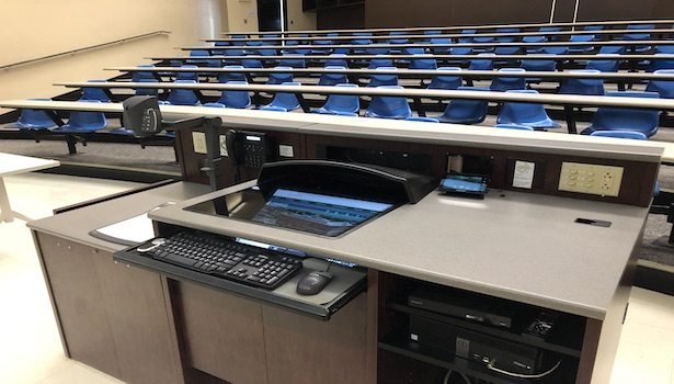 Photo shows the podium in the classroom with the PC/Touch Panel.