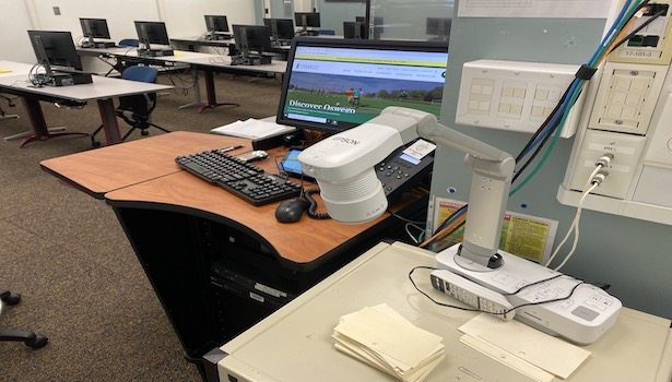Photo shows the podium with the Document camera that you can move around the corner to use.