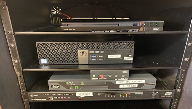Photo shows the PC and Blu Ray player in the room located in the podium.