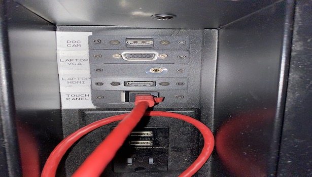 Photo of the podium spot where you can plug a laptop into.