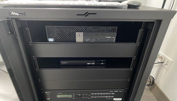 Photo shows the PC and Blu Ray player in the room located in the podium.