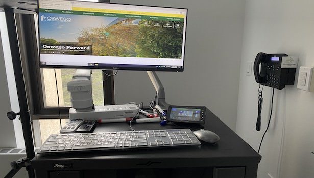 Photo shows the top of the podium where the PC Monitor and Touch Panel are.