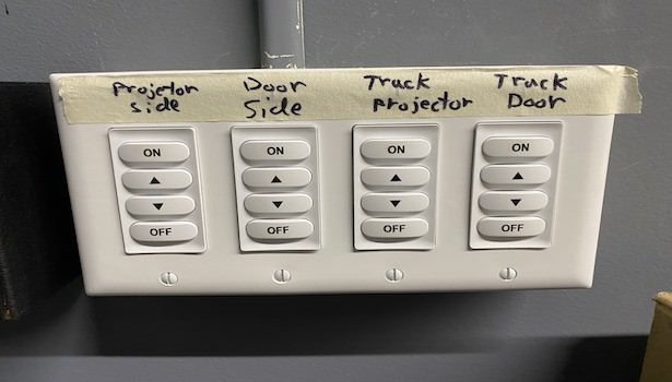 Photo of the light switch in the room near the cart.