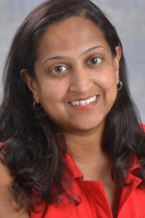 headshot of Ritu Radhakrishnan