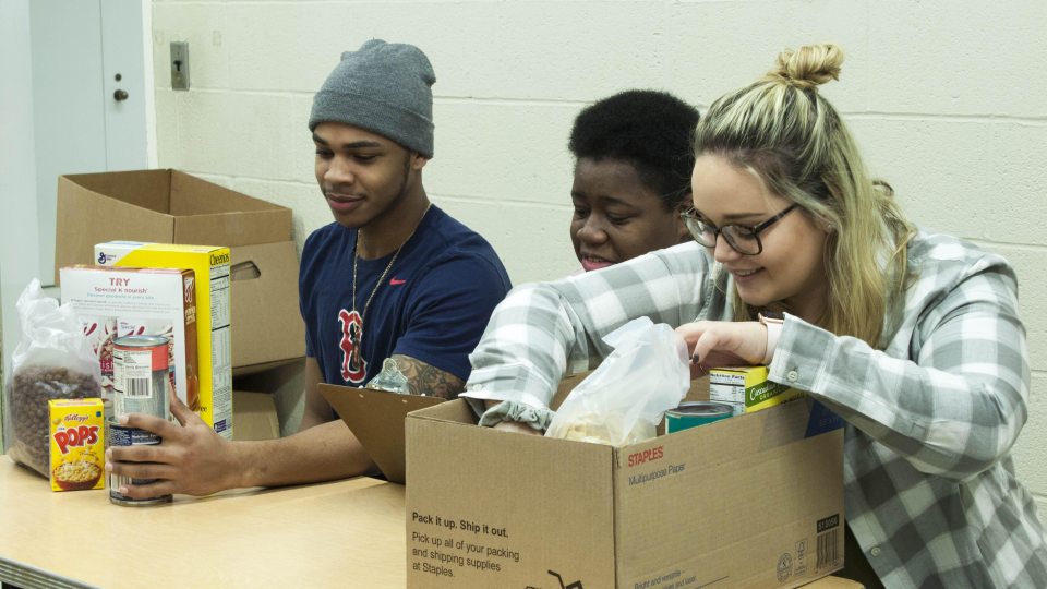 SHOP volunteers sorting through donations