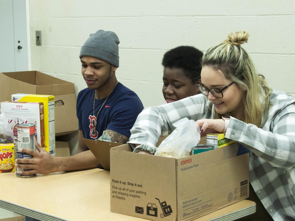 SHOP volunteers sorting through donations