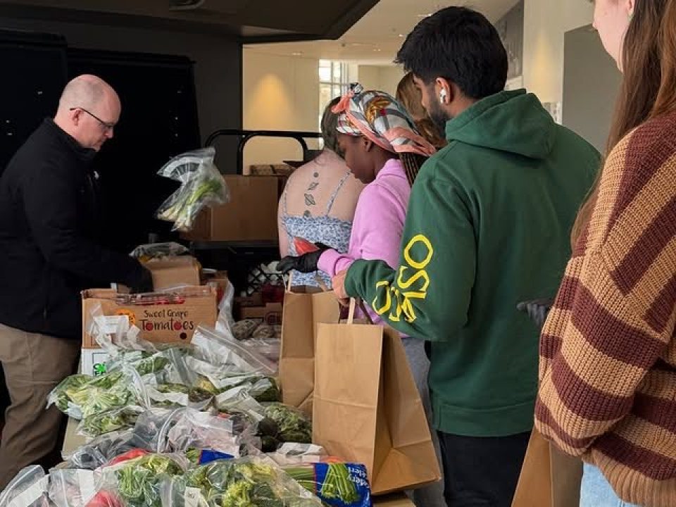 Students line-up for Fresh Produce Giveaway. 