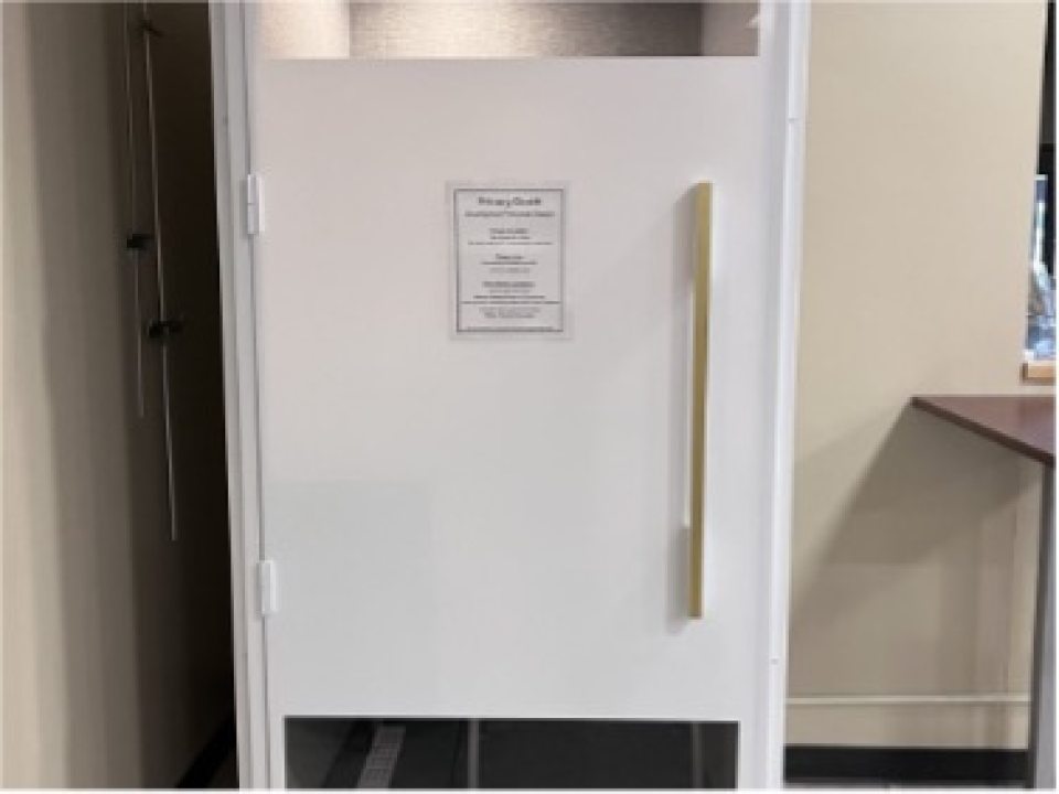 White cubical with the door closed