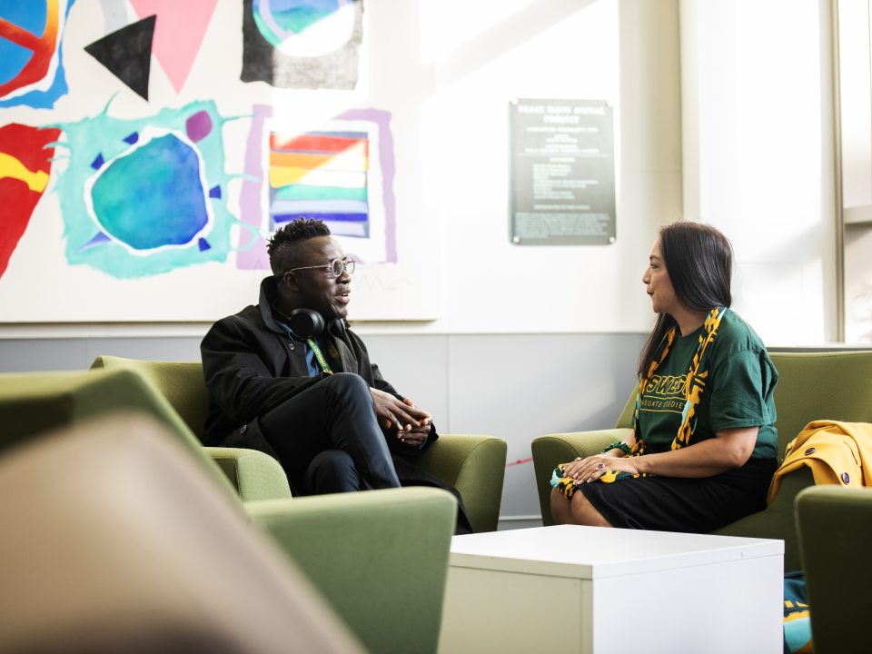Two students in conversation