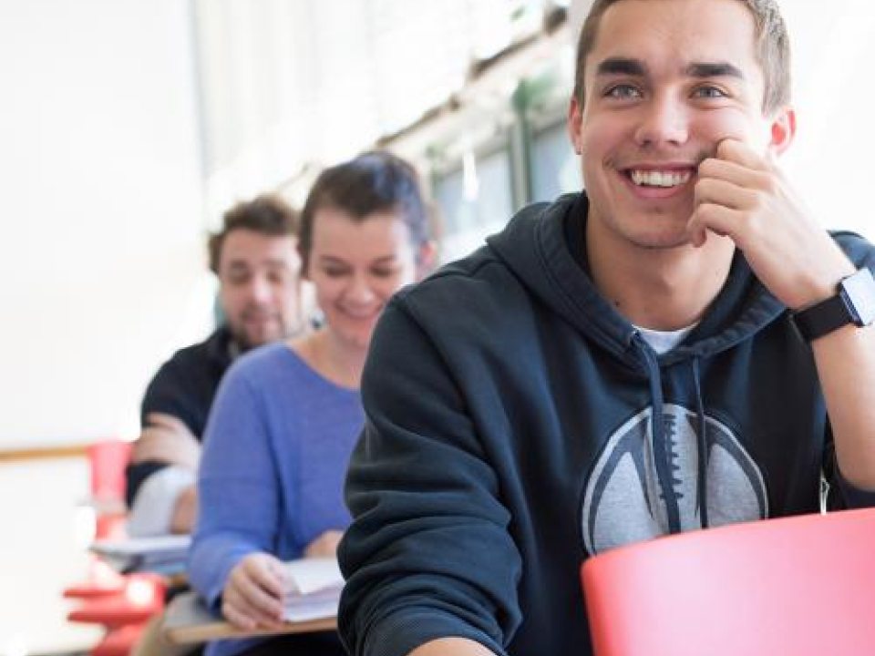 smiling students in class