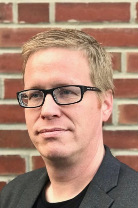 headshot of Brian Dempsey
