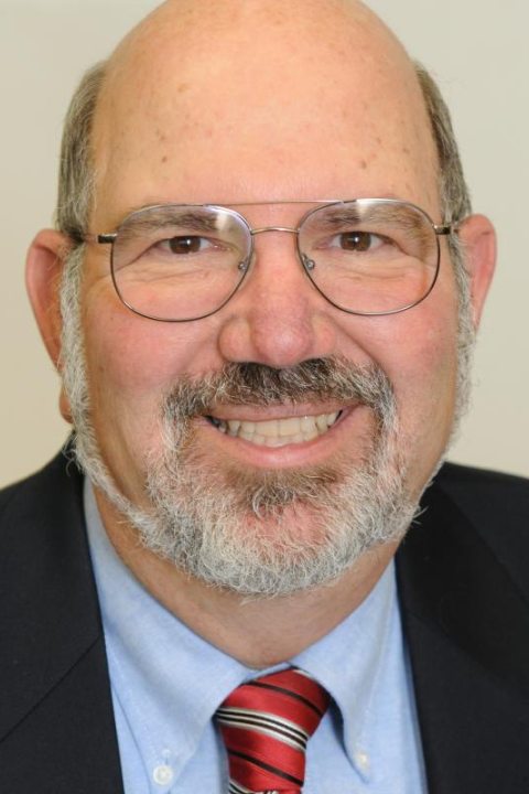 headshot of Lawrence Spizman