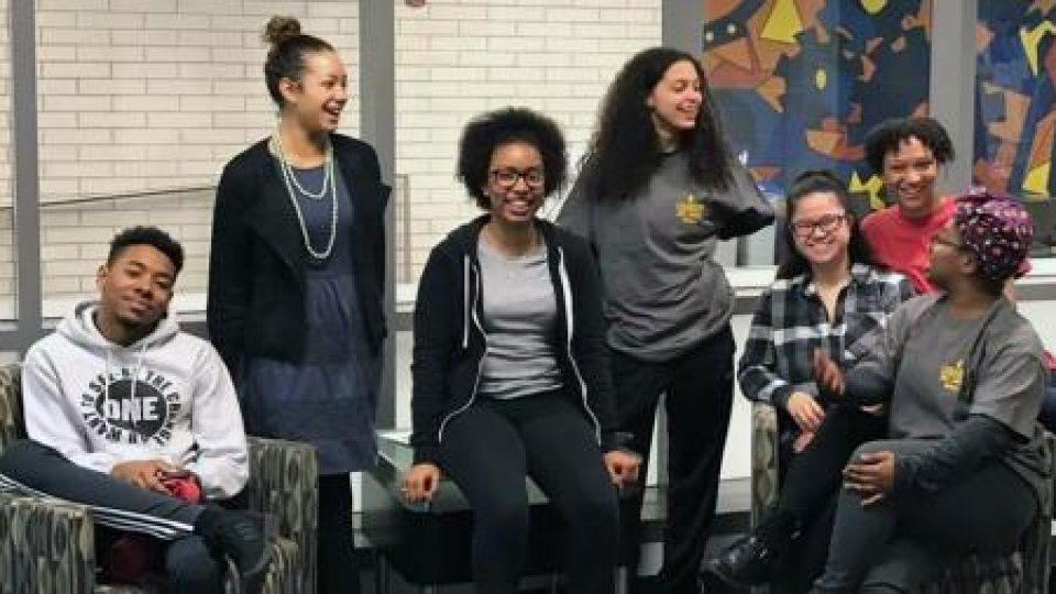 A group of students smiling