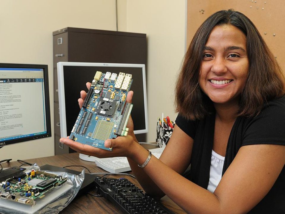 Marianne Hromalik holding an electrical device