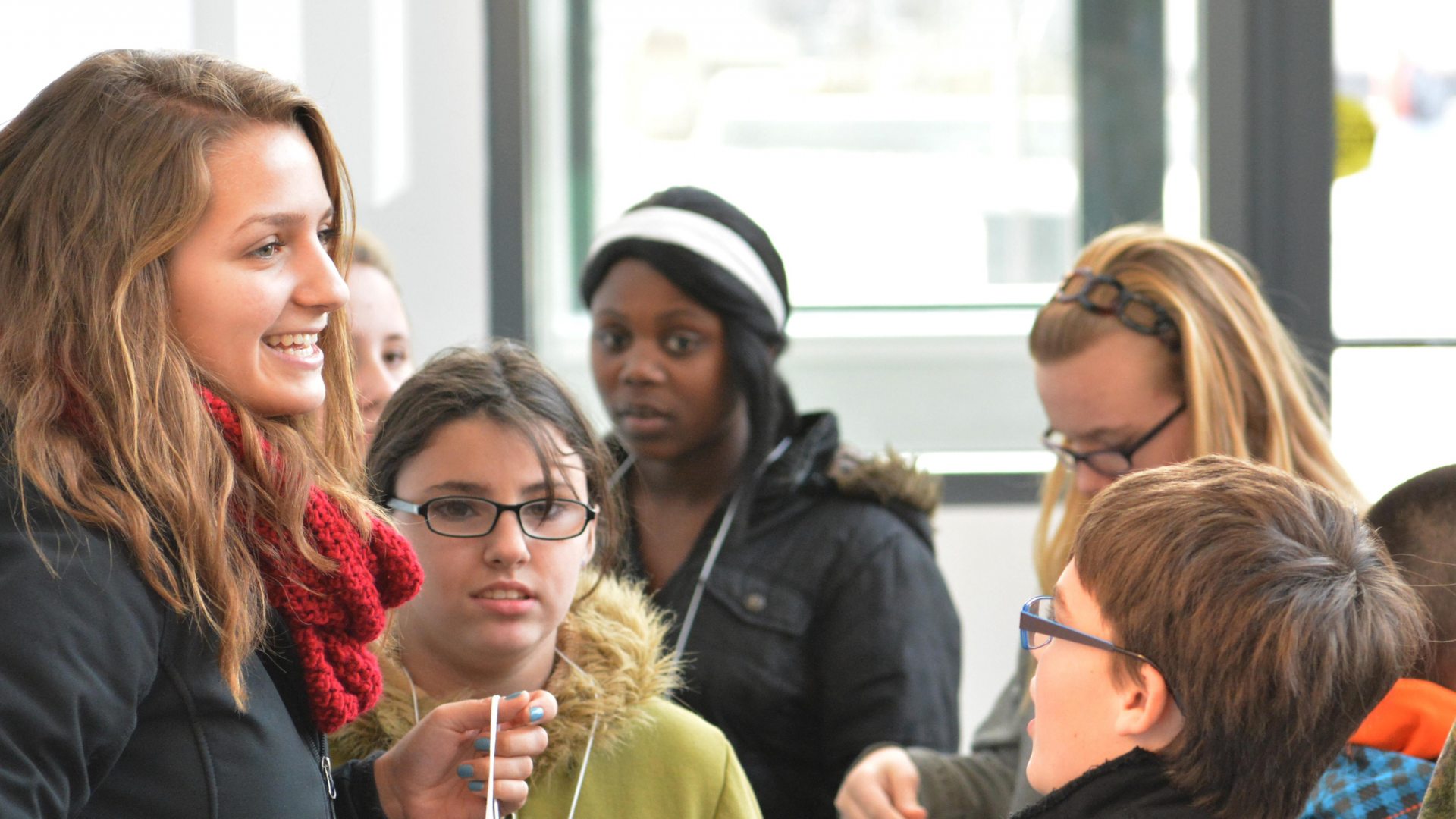 A mentor leading a group of students