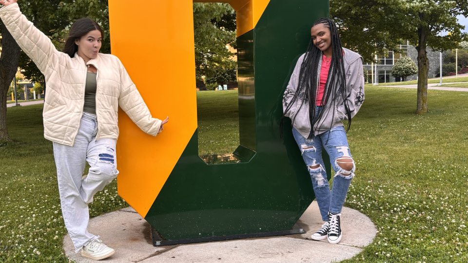 Students posing on campus