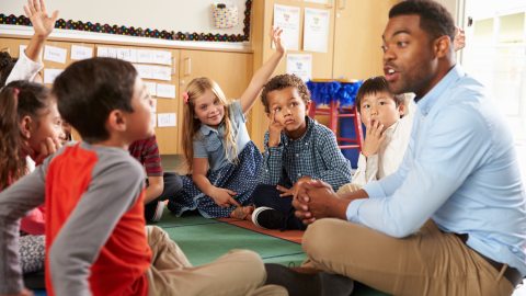 teacher in elementary classroom