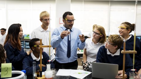 teacher in classroom with students