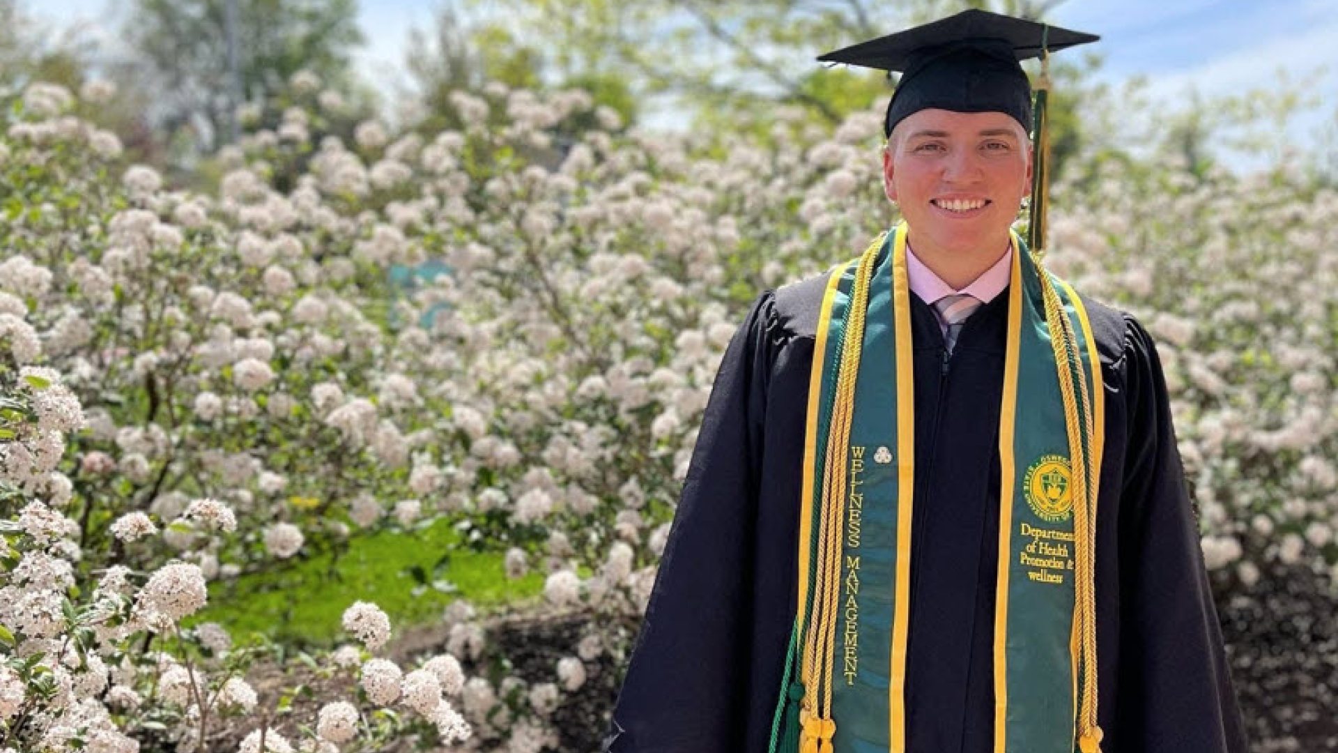 Picture of HPW Graduate in regalia