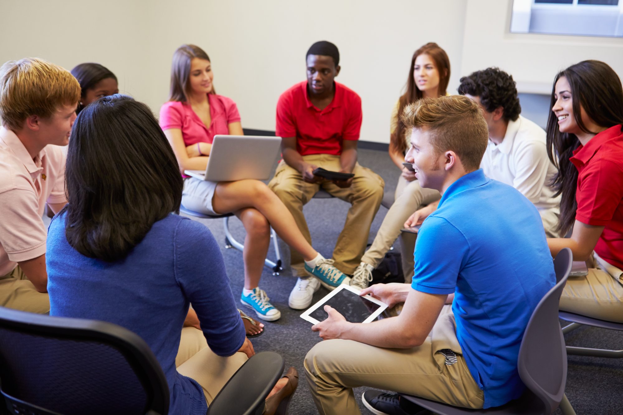 high school students in group discussion
