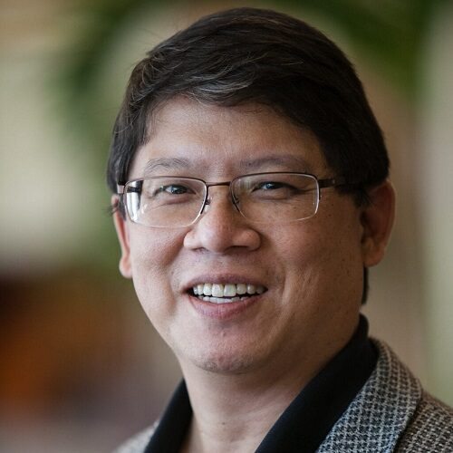 Jim Fong portrait against a blurred background