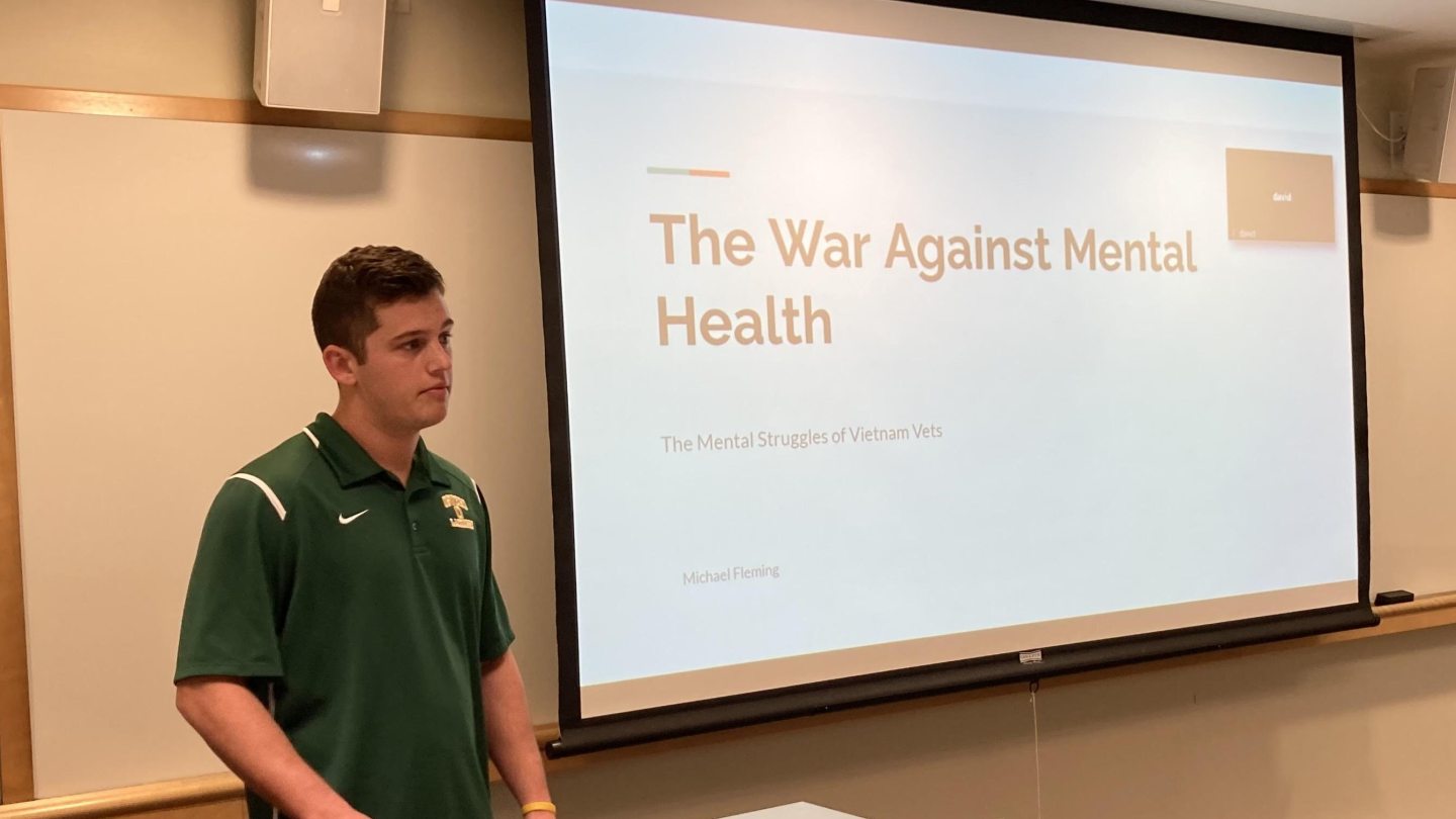 Michael Flemming giving a presentation at quest 2022