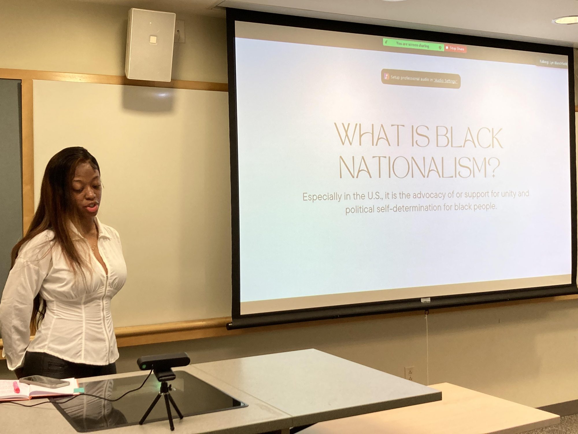 Michelle Thomas giving a presentation at quest 2022