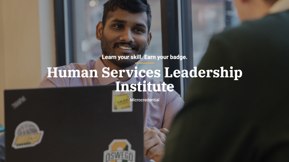 Student meeting with an advisor across a table with a laptop, representing professional development, with text promoting the Human Services Leadership Institute microcredential.