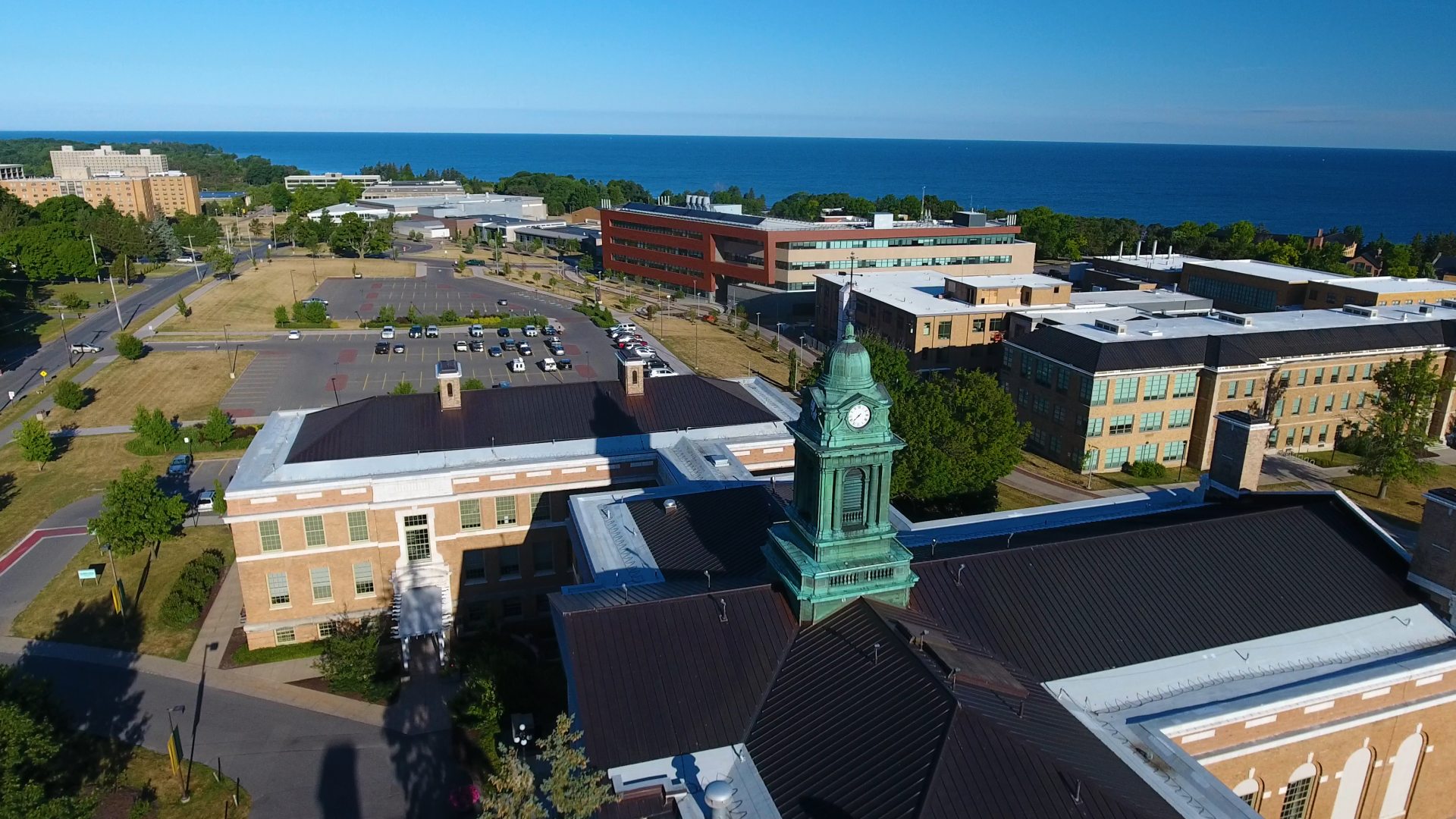 aerial shot of SUNY Oswego campus overlooking Sheldon Hall