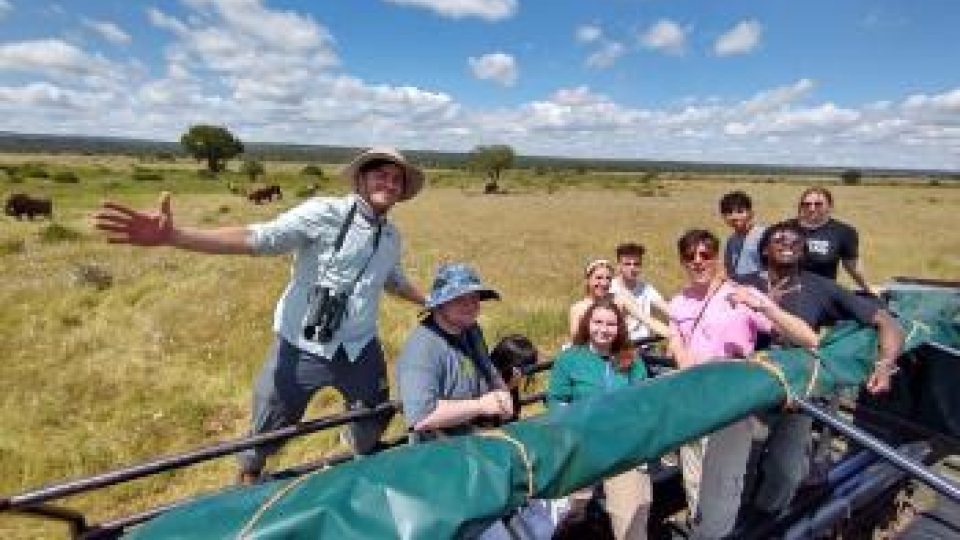 A group of people in a crew boat