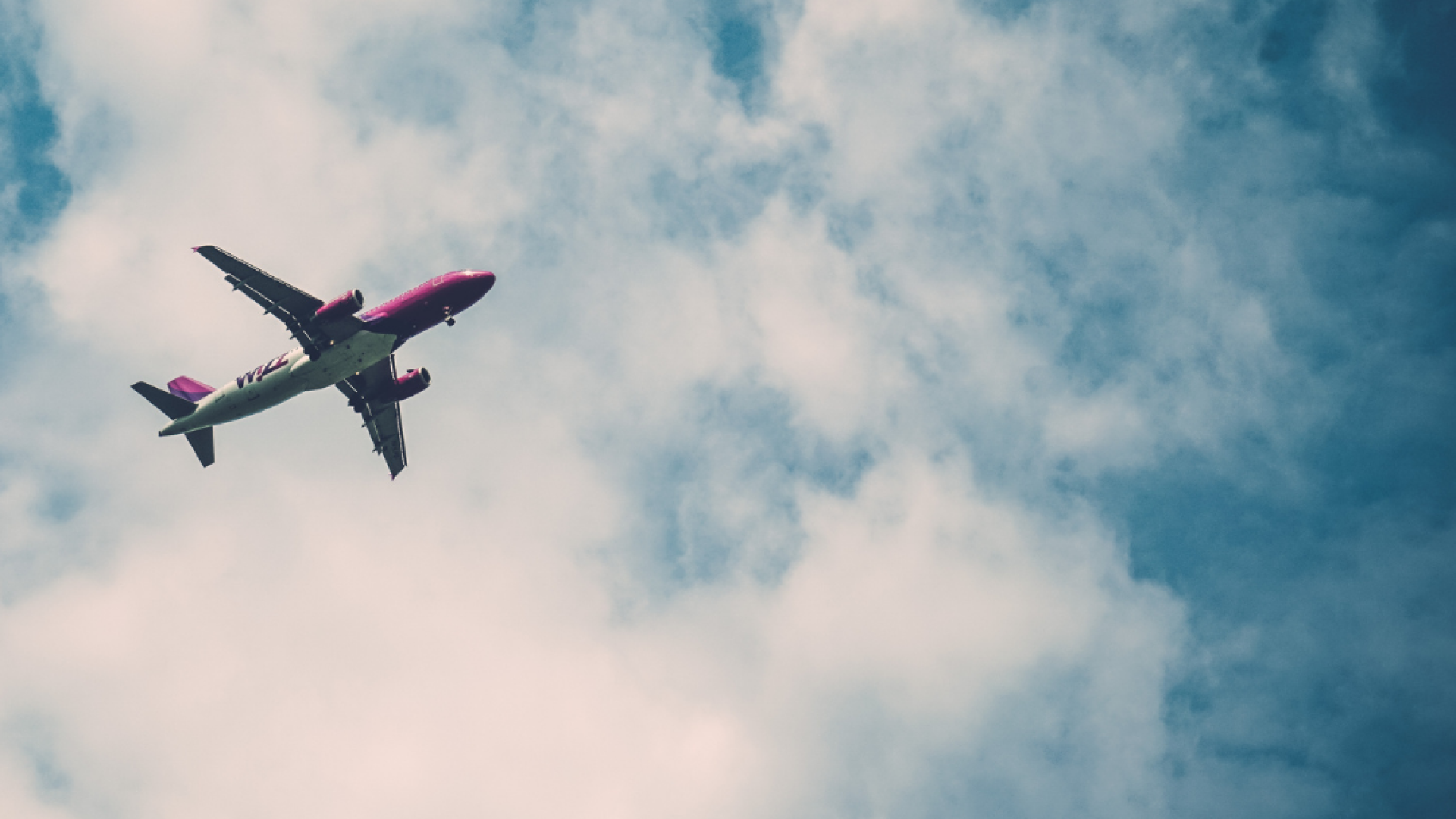 Looking at the underside of an airplane as it passes overhead