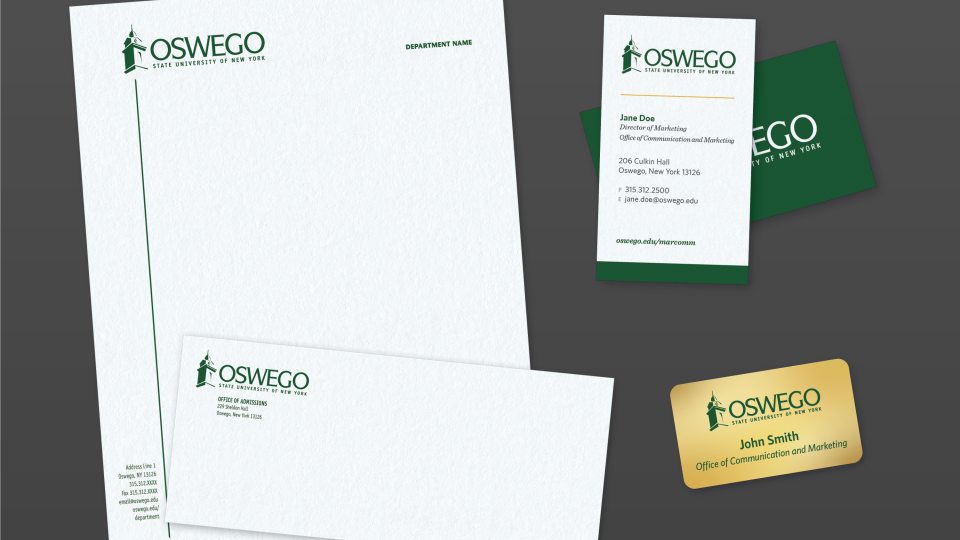 SUNY Oswego branded letterhead, envelope, business card, and name badge