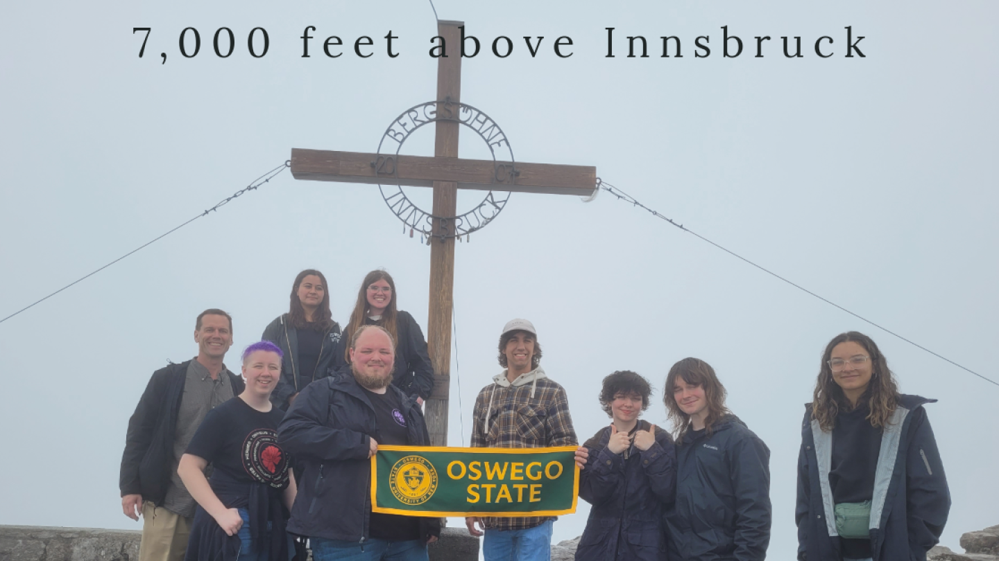 students on top of a mountain