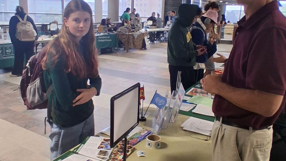 Patrick and Martina standing at a table at the Major and Minor Fair