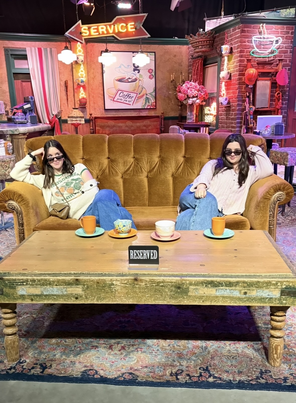Oswego students Madison Gordon (left) and Samantha Citarell visit the set of 