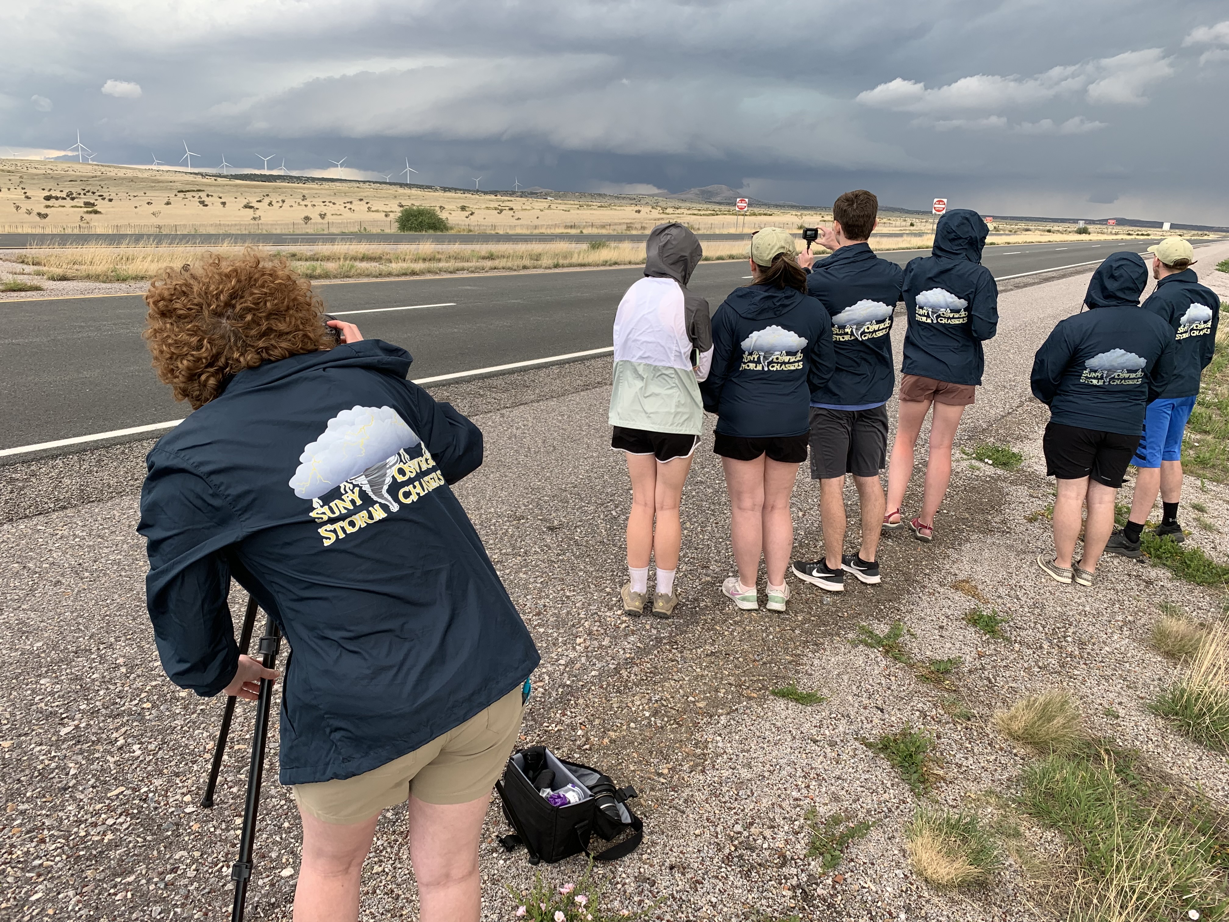 The Oswego Chasers team gathering pictures of a storm.